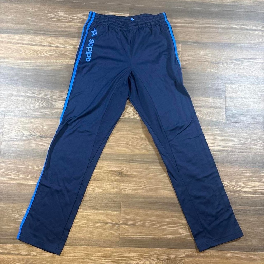Adidas navy blue track pants with blue stripes